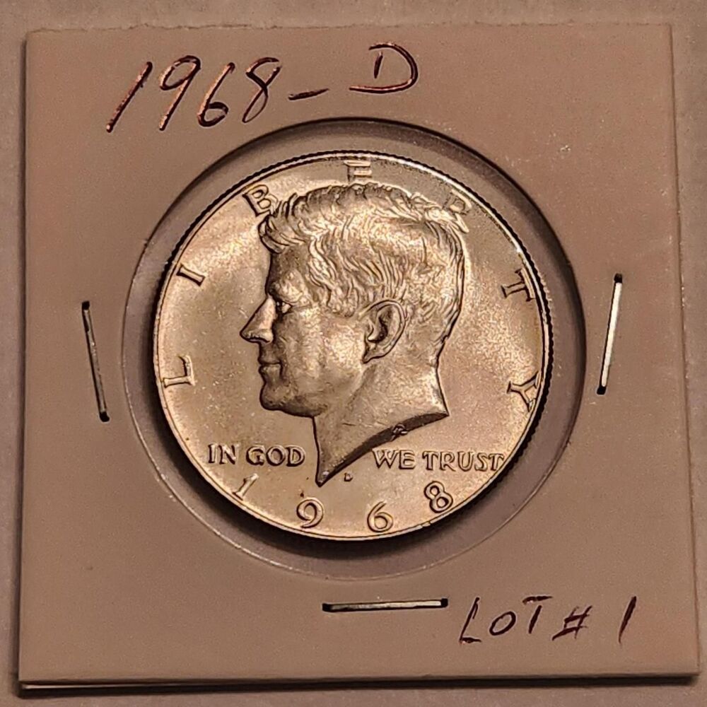 This coin is a 1968-D Kennedy Half Dollar in...